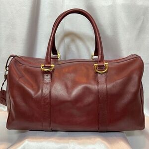 Impressive Cartier over night bag. Wine leather.  65-B3a